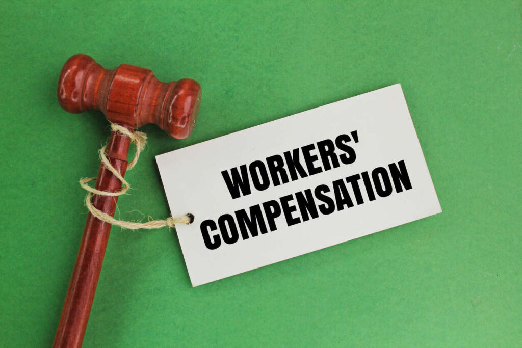 Gavel and workers compensation sign board