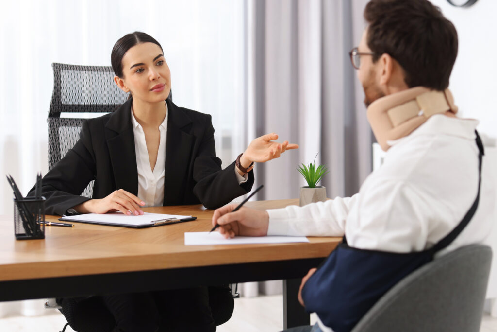 Personal injury attorney meeting with client in Rock Hill office 