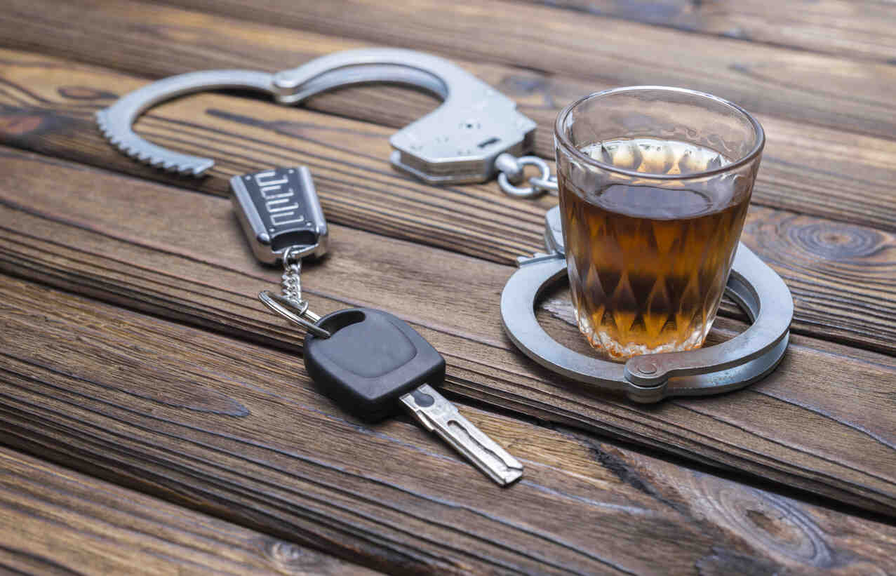 The image symbolizes the serious consequences of DUI charges involving accidents, injuries, or property damage.